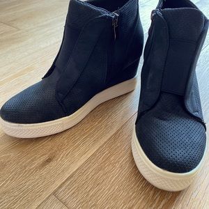 Black hidden platform sueded sneakers made by Ccocci. Size 6.5